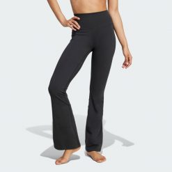 Legginsy All Me Flare. Czarne legginsy damskie Adidas, bez wzorów. Za 279.00 zł.