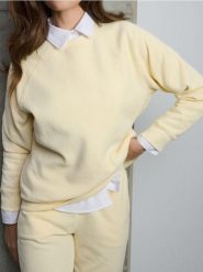 Bluza crewneck - żółty. Żółte bluzy damskie Sinsay, l, bez wzorów, sportowe, bez ramiączek, bez kaptura. Za 35.99 zł.