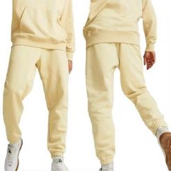 Spodnie sportowe męskie dresowe Puma Classic. Brązowe spodnie sportowe męskie Puma, l, bez wzorów, z dresówki. Za 119.00 zł.
