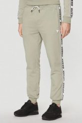 GUESS Zielone męskie spodnie dresowe z lampasami New Arlo. Zielone spodnie sportowe męskie Guess, m, z aplikacjami, z dresówki. W wyprzedaży za 286.99 zł.