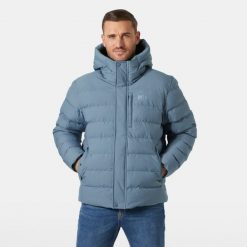 Ocieplana kurtka z kapturem Helly Hansen Alby. Niebieskie kurtki męskie Helly Hansen, bez wzorów, z puchu, sportowe, z kapturem. W wyprzedaży za 1,021.50 zł.