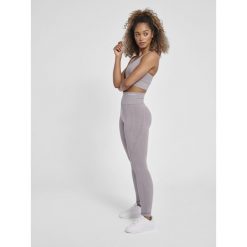 Legginsy damskie Hummel MT Flow. Fioletowe legginsy damskie Hummel, bez wzorów, z dzianiny. W wyprzedaży za 229.00 zł.