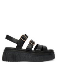 Clarks Sandały Evamar Strap 26185888 Czarny. Czarne sandały damskie Clarks, bez wzorów, ze skóry, bez obcasa, na płaskiej podeszwie, bez zapięcia. Za 519.99 zł.
