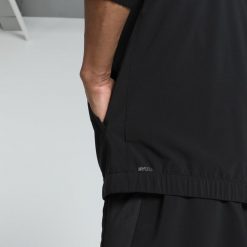 Męska kurtka do biegania VELOCITY PUMA Black. Czarne kurtki męskie Puma, m, bez wzorów, bez kaptura, do biegania. W wyprzedaży za 204.00 zł.