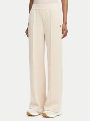 Guess Spodnie dresowe V6YB18 K4315 Beżowy Regular Fit. Brązowe spodnie dresowe damskie Guess, z aplikacjami, z dresówki. Za 394.99 zł.