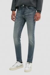 TOMMY JEANS Niebieskie jeansy męskie. Niebieskie jeansy męskie Tommy Jeans, z bawełny. W wyprzedaży za 289.99 zł.