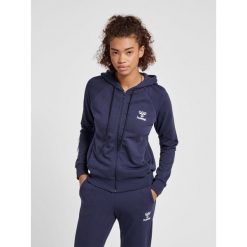 Damska bluza z kapturem zapinana na zamek Hummel Noni 2.0. Niebieskie bluzy damskie Hummel, na wiosnę, m, bez wzorów, z bawełny, klasyczne, bez ramiączek, z kapturem. Za 217.15 zł.