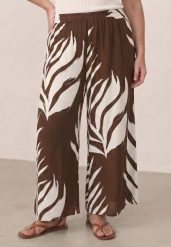 Brązowe Wiskozowe Spodnie Casual o Fasonie Culottes w Roślinny Wzór Aliope. Brązowe spodnie materiałowe damskie Born2be, bez wzorów, z jeansu, biznesowe. Za 89.99 zł.