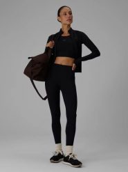 Damskie legginsy do jogi z wykończeniem szybkoschnącym. Czarne legginsy damskie 4F, bez wzorów, z elastanu. Za 179.99 zł.