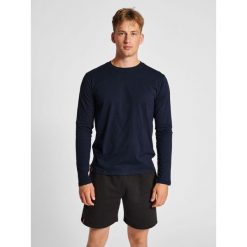 Koszulka z długim rękawem Hummel Red Basic. Niebieskie bluzy męskie Hummel, m, bez wzorów, z bawełny, sportowe, bez ramiączek, bez kaptura. Za 114.50 zł.