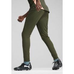 Męskie spodnie treningowe Manchester City PUMA Myrtle Bold Blue Green. Niebieskie spodnie sportowe męskie Puma, m, bez wzorów, z dresówki, do piłki nożnej. W wyprzedaży za 212.00 zł.
