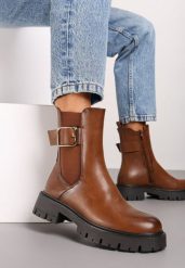 Brązowe Botki Sztyblety na Tłoczonej Podeszwie z Elegancką Klamerką przy Cholewce Vaithora. Brązowe botki damskie Renee, bez wzorów, eleganckie, bez obcasa, na płaskiej podeszwie, bez zapięcia. Za 149.99 zł.