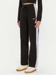 Ellesse Spodnie dresowe Schmitten SGX20913 Czarny Regular Fit. Czarne spodnie dresowe damskie Ellesse, bez wzorów, z dresówki. Za 179.99 zł.