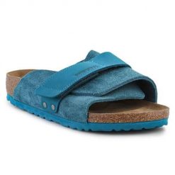 Klapki damskie Birkenstock Kyoto. Niebieskie klapki damskie Birkenstock, na lato, bez wzorów, z materiału, bez obcasa, bez zapięcia. Za 784.75 zł.