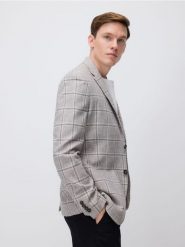 Marynarka slim fit z lnem - beżowy. Brązowe garnitury męskie Reserved, l, bez wzorów, z bawełny. W wyprzedaży za 219.99 zł.