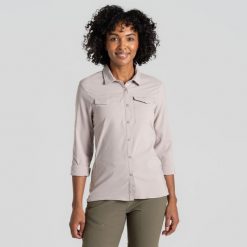 Koszula podróżnicza damska Craghoppers NosiLife Pro LS Shirt III. Brązowe koszule damskie Craghoppers, bez wzorów, casualowe, bez kołnierzyka, bez ramiączek. Za 424.99 zł.