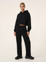 Bluza hoodie o fasonie bombki z bawełną Active - czarny. Czarne bluzy damskie Sinsay, l, bez wzorów, z bawełny, sportowe, bez ramiączek, bez kaptura. Za 59.99 zł.