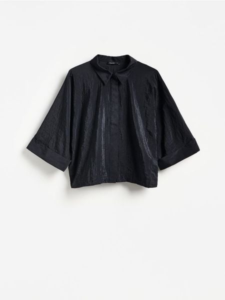 Koszula ze ściągaczem - czarny. Czarne koszule damskie Reserved, l, bez wzorów, z tkaniny, bez kołnierzyka, bez ramiączek. Za 129.99 zł.