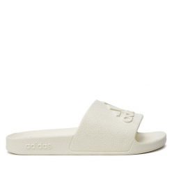 Klapki adidas. Białe klapki damskie Adidas, bez wzorów, sportowe, bez obcasa, bez zapięcia. Za 79.99 zł.