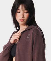 Rozpinana bluza sportowa dla kobiet Carpatree Varsity Chic. Czarne bluzy damskie Carpatree, s, bez wzorów, z bawełny, sportowe, bez ramiączek. Za 215.99 zł.