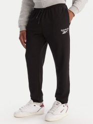 Reebok Spodnie dresowe Winslow RK25140CCM Czarny Regular Fit. Czarne spodnie sportowe męskie Reebok, m, bez wzorów, z bawełny. Za 199.99 zł.