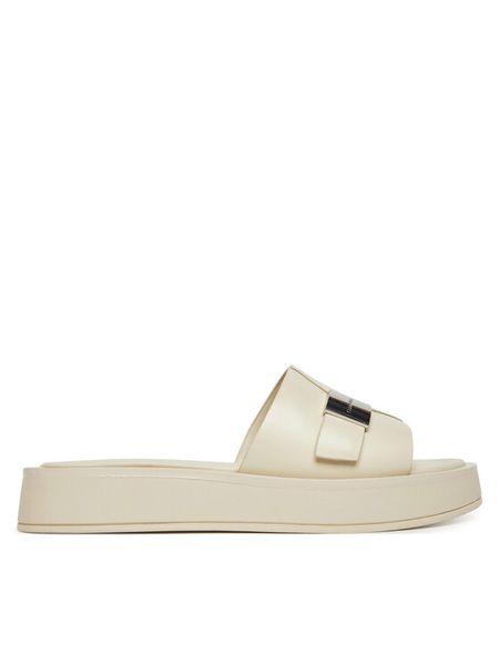 Calvin Klein Klapki Flatform Slide W/Ck Hw - Lth HW0HW02368 Écru. Klapki damskie Calvin Klein, bez wzorów, ze skóry, bez obcasa, bez zapięcia. Za 339.99 zł.