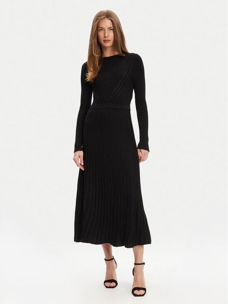 United Colors Of Benetton Sukienka dzianinowa 1QMKDV01W Czarny Regular Fit. Czarne sukienki damskie United Colors Of Benetton, s, bez wzorów, z dzianiny, bez kołnierzyka, bez ramiączek. Za 369.99 zł.