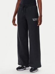 New Balance Spodnie dresowe WP51954 Czarny Wide Leg. Czarne spodnie dresowe damskie New Balance, bez wzorów, z dresówki. Za 169.99 zł.