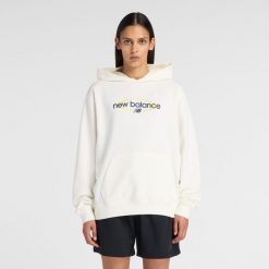 Bluza damska New Balance WT61150XSST – biała. Białe bluzy damskie New Balance, m, bez wzorów, z bawełny, bez ramiączek, z kapturem. Za 279.99 zł.