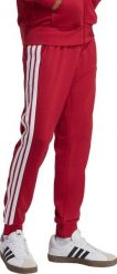 Adidas Spodnie męskie adidas Essential 3-Stripes French Terry bordowe KR2702 L. Czerwone spodnie sportowe męskie Adidas, l, bez wzorów. Za 236.51 zł.