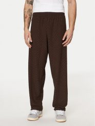 Adidas Spodnie dresowe Monogram Track JP4428 Brązowy Regular Fit. Brązowe komplety dresowe męskie Adidas, l, bez wzorów, z dresówki. Za 199.99 zł.