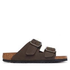 Klapki Birkenstock. Brązowe klapki damskie Birkenstock, bez wzorów, bez obcasa, bez zapięcia. Za 674.99 zł.