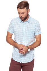 KOSZULA WRANGLER SS 1PKT SHIRT CERULEAN W5881OPVT 112129597. Koszule męskie Wrangler, m, bez wzorów, z bawełny, klasyczne, bez kołnierzyka, bez ramiączek. W wyprzedaży za 59.99 zł.