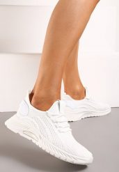 Białe Sznurowane Buty Sportowe na Grubszej Podeszwie Unamarie. Białe obuwie sportowe damskie Born2be, bez wzorów, z jeansu, bez zapięcia. Za 49.99 zł.