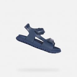 Sandały Geox Fusbetto. Niebieskie sandały męskie Geox, bez wzorów, z gumy, sportowe, bez zapięcia. Za 264.00 zł.