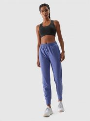 4F Spodnie treningowe szybkoschnące damskie - granatowe XL. Niebieskie spodnie dresowe damskie 4F, bez wzorów, z dzianiny, sportowe. W wyprzedaży za 99.99 zł.