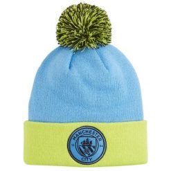 Młodzieżowa czapka beanie z pomponem Manchester City PUMA Magic Blue Yellow Glow. Niebieskia czapki damskie Puma, bez wzorów, młodzieżowe. Za 142.99 zł.