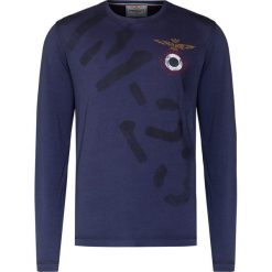T-shirt AERONAUTICA MILITARE. Szare t-shirty męskie Aeronautica Militare, s, bez wzorów, z bawełny, bez kołnierzyka, bez ramiączek. Za 370.00 zł.