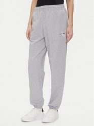 Calvin Klein Jeans Spodnie dresowe Monologo LV047B235G Szary Regular Fit. Szare spodnie dresowe damskie Calvin Klein Jeans, bez wzorów, z bawełny. Za 239.99 zł.