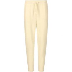 Damskie spodnie dresowe Athlecia Jacey V2. Żółte spodnie dresowe damskie Athlecia, bez wzorów, z dresówki, sportowe, na fitness i siłownię. Za 249.00 zł.