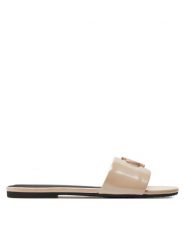 Calvin Klein Jeans Klapki Flat Sandal Slide Mg Met YW0YW01348 Beżowy. Brązowe klapki damskie Calvin Klein Jeans, bez wzorów, z jeansu, bez obcasa, bez zapięcia. Za 279.99 zł.