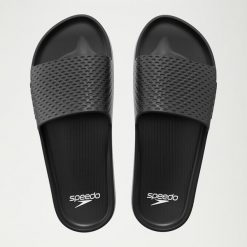 Klapki basenowe antypoślizgowe damskie Speedo Slide Entry. Czarne klapki damskie Speedo, na lato, bez wzorów, z materiału, bez obcasa, bez zapięcia. Za 63.99 zł.