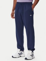 Adidas Spodnie dresowe Trefoil Essentials French Terry KT2455 Granatowy Regular Fit. Niebieskie spodnie sportowe męskie Adidas, l, bez wzorów, z bawełny. Za 239.99 zł.