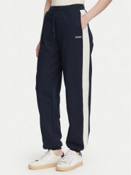 Guess Spodnie dresowe V6YB09 K4292 Granatowy Regular Fit. Niebieskie spodnie dresowe damskie Guess, z aplikacjami, z dresówki. Za 394.99 zł.