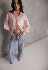 Niebieskie Jeansy Szerokie z Bawełną High Waist Ozdobione Wiązanym Sznurkiem Neviolla. Niebieskie jeansy damskie Renee, bez wzorów, z bawełny, z podwyższonym stanem. Za 119.99 zł.