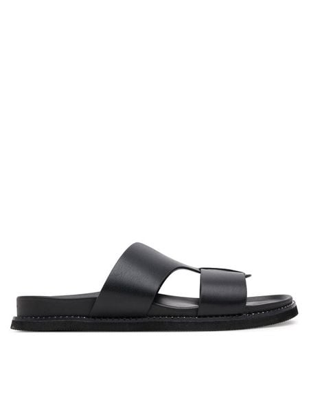 JENNY Klapki CT0810-7 Czarny. Czarne klapki damskie Jenny, bez wzorów, z syntetyku, bez obcasa, bez zapięcia. Za 119.99 zł.