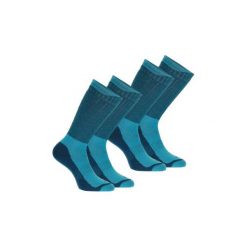 Skarpety turystyczne SH500 ultra-warm mid. Niebieskie skarpetki damskie QUECHUA, bez wzorów, z elastanu. Za 49.99 zł.