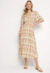 Ciemnobeżowa Sukienka Wiskozowa Rozkloszowana z Odkrytymi Plecami w Print Boho Turaisa. Brązowe sukienki damskie Born2be, na co dzień, l, bez wzorów, z wiskozy, boho, bez kołnierzyka, bez ramiączek, midi, proste. Za 64.99 zł.