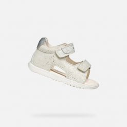 Sandały Geox Model B Sandal Macchia Gir Kolor Biały. Białe sandały męskie Geox, na lato, bez wzorów, ze skóry, bez zapięcia. Za 226.99 zł.