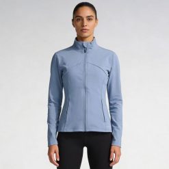 Damska kurtka Softee Fusion Azul Acero. Niebieskie kurtki sportowe damskie Softee, m, bez wzorów, z elastanu, bez ramiączek, bez kaptura, na fitness i siłownię. Za 197.99 zł.